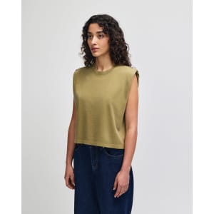A women's muscle T-shirt in olive green, featuring a cropped design and sleeveless style. It has branding on it.