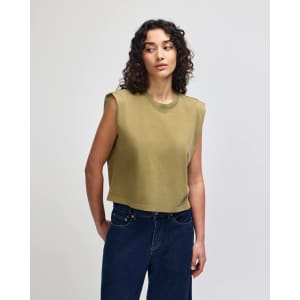 A muscled women's t-shirt in olive green, featuring a loose fit and wide armholes, with a branded logo.