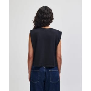 A women's muscle T-shirt in dark grey with a cropped design and sleeveless style. It features a logo on the back.