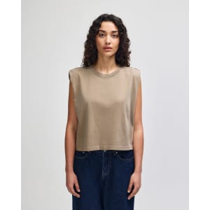 A women's muscle t-shirt in a brown hue, featuring a sleeveless design and a relaxed fit.