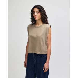 A women's muscle T-shirt in olive green with a relaxed fit and sleeveless design, featuring a logo.