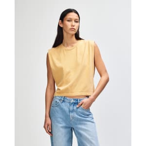 A women's muscle T-shirt in a sandy beige colour, featuring a simple design and no sleeves.