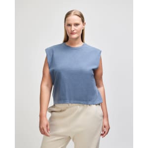 A women's muscle t-shirt in a deep blue shade, featuring a round neckline and a loose fit.