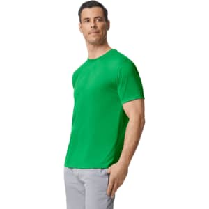 A green adult t-shirt on a model, featuring a crew neck and short sleeves, with a logo on the sleeve.