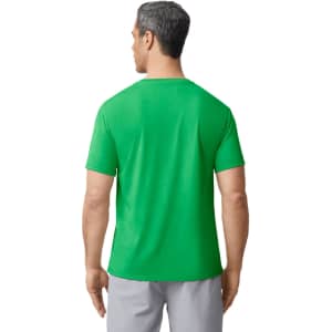A green Gildan Performance adult t-shirt is displayed, showing the back view on a model. The shirt has a logo.
