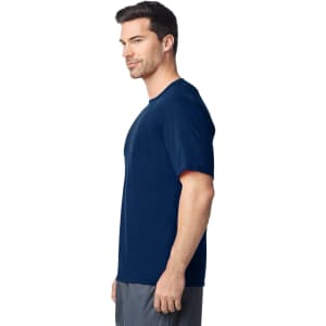 A navy blue Gildan Performance adult t-shirt displayed on a male model, featuring a logo.