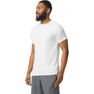 A white Gildan Performance adult T-shirt displayed on a male model, featuring short sleeves and a round neckline.