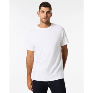 A white adult t-shirt is displayed on a male model with a simple, classic design and a round neck.