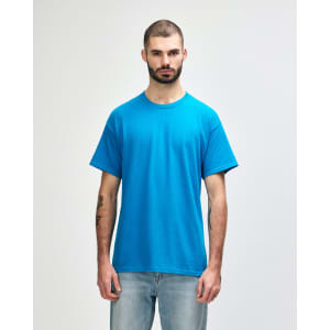 A turquoise Gildan Heavy Cotton adult T-shirt displayed on a male model against a plain background.
