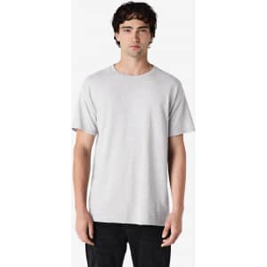 A grey Gildan Heavy Cotton adult T-shirt is displayed, featuring a simple design and short sleeves.