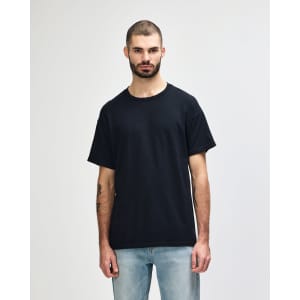 A black Gildan Heavy Cotton adult T-shirt displayed on a model against a plain background.