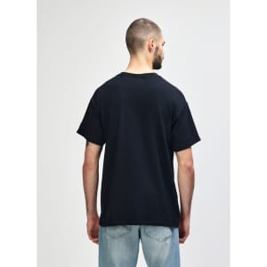 A black Gildan Heavy Cotton Adult T-Shirt displayed from the back, featuring short sleeves and a simple design.