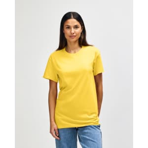 A yellow Gildan Heavy Cotton Adult T-Shirt displayed on a model, featuring a simple design and a logo.