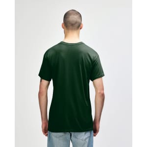 A dark green Gildan Heavy Cotton Adult T-Shirt displayed on a male model from the back, featuring a logo.