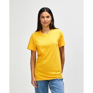 A model wearing a bright yellow Gildan Heavy Cotton adult T-shirt, standing against a plain white background.