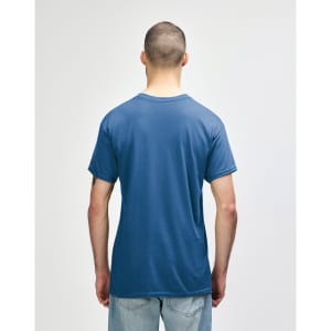 A blue Gildan Heavy Cotton Adult T-Shirt is displayed from the back, featuring a simple design and a logo.
