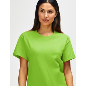 A man wearing a bright lime green Gildan Heavy Cotton adult t-shirt featuring a round neckline and visible branding.