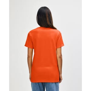 An orange Gildan Heavy Cotton adult t-shirt displayed from the back, featuring a simple design and a logo.