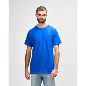 A blue Gildan Heavy Cotton Adult T-Shirt on a male model, featuring short sleeves and a relaxed fit.