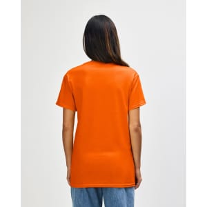 An orange Gildan Heavy Cotton Adult T-Shirt displayed from the back, featuring a plain design and short sleeves.