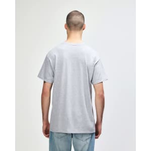 A grey Gildan Heavy Cotton adult t-shirt with short sleeves, viewed from the back. It features a logo on the label.
