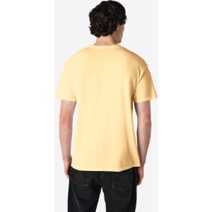 A plain yellow Gildan Heavy Cotton adult T-shirt viewed from the back, featuring a casual fit.