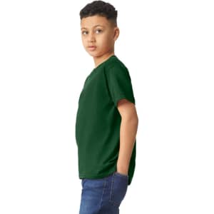 A green Gildan Heavy Cotton Youth T-Shirt displayed on a young model, featuring a logo on the front.