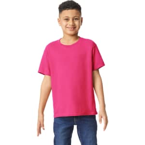 A youth t-shirt in vibrant pink, featuring a classic crew neck and short sleeves, modelled by a smiling child.