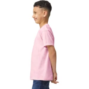 A youth t-shirt in a vibrant pink colour, shown from the side with a logo present.