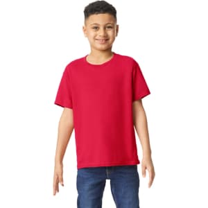 A red Gildan Heavy Cotton Youth T-Shirt displayed on a smiling child, featuring short sleeves.