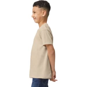 A youth t-shirt in beige, displayed from the side, with a logo on it.