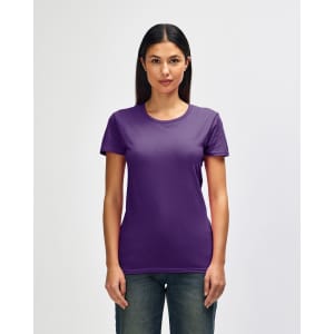 A purple Gildan Heavy Cotton Ladies' T-Shirt is displayed on a model, featuring short sleeves and a round neckline.