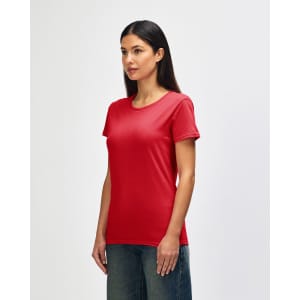 A red Gildan Heavy Cotton Ladies' T-Shirt displayed on a model, featuring a classic fit and short sleeves.