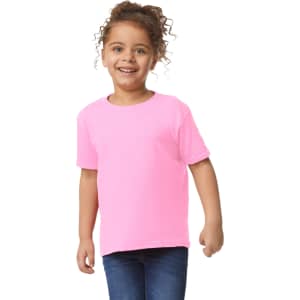 A pink toddler t-shirt with short sleeves, featuring a branding logo, worn by a smiling child.