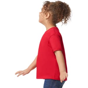 A red toddler T-shirt displayed on a child from the side, featuring short sleeves and a loose fit.