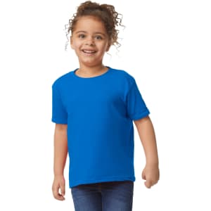 A toddler wearing a bright blue Gildan Heavy Cotton T-Shirt and denim jeans, smiling at the camera.