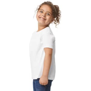 A white toddler T-shirt displayed on a child, featuring a round neck and short sleeves. The shirt has a branding logo.