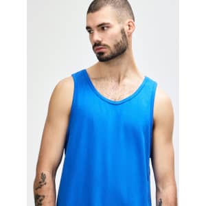 A blue Gildan Heavy Cotton adult tank top displayed on a model. The tank has a round neckline and no visible branding.