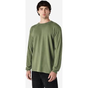A long sleeve t-shirt in olive green, featuring a simple design and a logo on the garment.