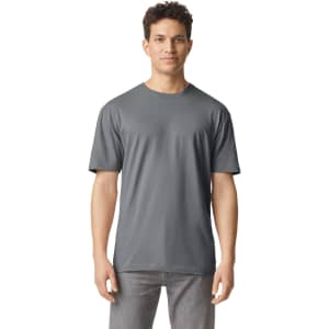 A plain grey adult T-shirt on a male model, featuring short sleeves and a round neckline. It has a logo.