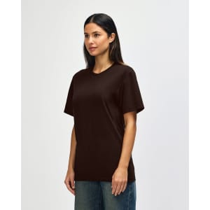 A brown Gildan Softstyle adult t-shirt displayed on a model, with a casual fit and no visible logos.