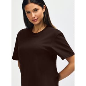 A brown Gildan Softstyle adult T-shirt displayed on a male model, featuring a round neckline and short sleeves.