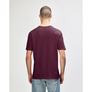 A maroon Gildan Softstyle adult T-shirt displayed from the back, featuring a plain design and short sleeves.