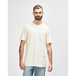 A white Gildan Softstyle adult t-shirt displayed on a male model, featuring a simple design and relaxed fit.