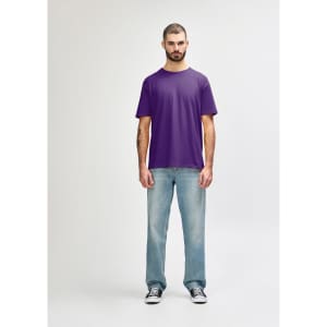 A purple Gildan Softstyle adult t-shirt displayed on a mannequin paired with light blue jeans and white shoes.