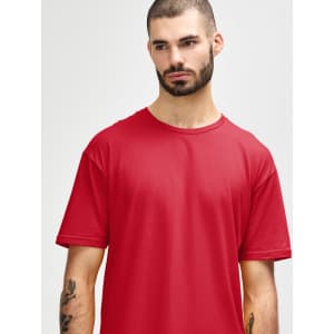 A red Gildan Softstyle Adult T-Shirt displayed on a model with a simple round neckline and a neutral expression.