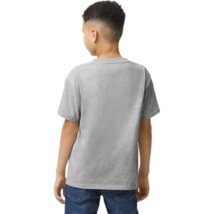 A boy wearing a grey Gildan Youth Softstyle short sleeve T-shirt, standing with his back to the viewer.