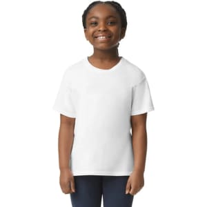 A young child smiles while wearing a white Gildan Youth Softstyle short sleeve T-shirt. The shirt has a logo.