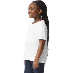 A white youth short sleeve T-shirt is displayed on a smiling child with long braids, set against a plain background.