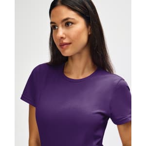 A purple Gildan Softstyle ladies' T-shirt displayed on a model with a neutral background.